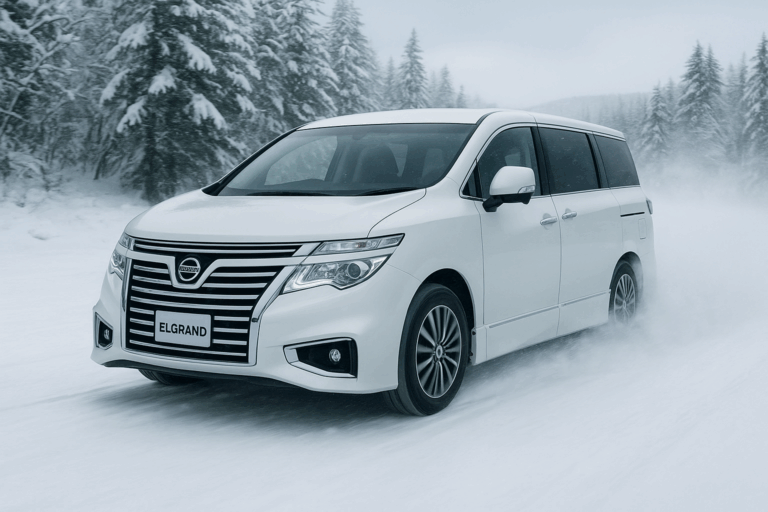 White Fourth Generation Nissan Elgrand driving in the snow